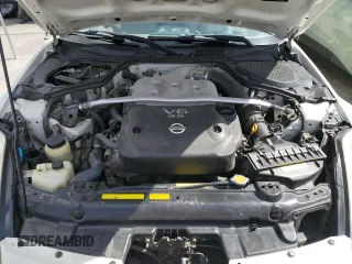 2006 Nissan 350Z Touring z VIN JN1AZ36A56M450937, wystawiony jako Copart lot #56544955 z przebiegiem 102 027 mil mil oraz Szkoda całkowita • Salvage title. Historia ofert i sprzedaży dostępna na DreamBid. Obrazek 11.