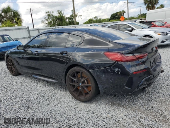 2020 BMW 8 Series M850i z VIN WBAGV8C06LBP48901, wystawiony jako Copart lot #57595725 z przebiegiem 88 332 mil mil oraz Czysty tytuł • Clean title. Historia ofert i sprzedaży dostępna na DreamBid. Obrazek 2.