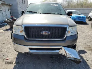 2007 Ford F-150 XLT with VIN 1FTPX14597NA52942, listed as a Copart auction lot 52980215 with 149,889 mi miles and Salvage Title. Bid and sale history available at carsss.com. Image 5.