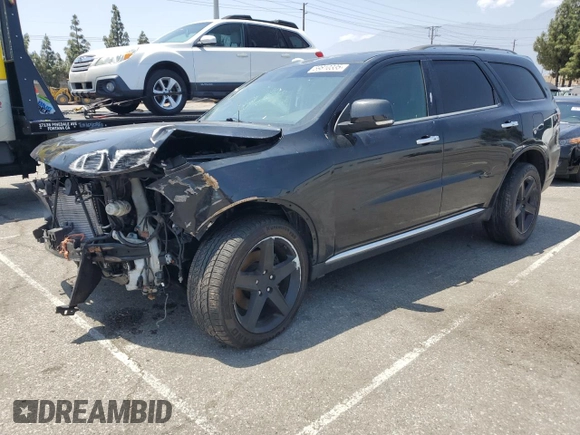 2013 Dodge Durango Citadel with VIN 1C4SDJET9DC505111, listed as a Copart auction lot 59810335 with 135,169 mi miles and Salvage title. Bid and sale history available at DreamBid. Image 1.