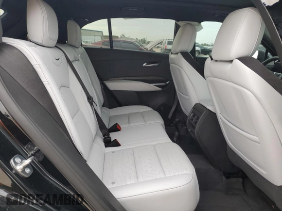 2024 Cadillac XT4 FWD Sport with VIN 1GYFZER46RF213543, listed as a Copart auction lot 83609754 with 3,878 mi miles and Salvage title. Bid and sale history available at DreamBid. Image 11.