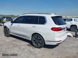 2020 BMW X7 xDrive40i with VIN 5UXCW2C00L9A03002, listed as a IAAI auction lot 41856130 with 33,713 mi miles. Bid and sale history available at carsss.com. Image 3.