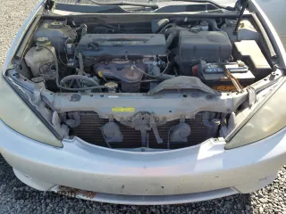 2005 Toyota Camry STD z VIN 4T1BE32KX5U540557, wystawiony jako Copart lot #50408435 z przebiegiem 268 848 mil mil oraz Szkoda całkowita • Salvage title. Historia ofert i sprzedaży dostępna na DreamBid. Obrazek 11.