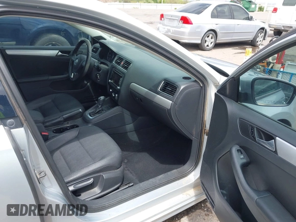 2012 Volkswagen Jetta TDI w/Premium & Nav с VIN 3VWLL7AJ7CM394566, выставлен на аукционе IAAI как лот 42203479 с пробегом 128 070 миль миль и . История ставок и продаж доступна на DreamBid. Изображение 5.