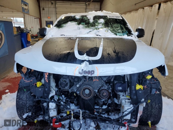 2020 Jeep Grand Cherokee Trailhawk with VIN 1C4RJFLT3LC247609, listed as a Copart auction lot 84491864 with 68,957 mi miles and Salvage title. Bid and sale history available at DreamBid. Image 5.