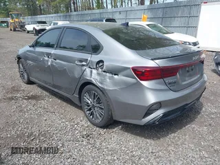 2022 Kia Forte GT-Line z VIN 3KPF54AD0NE490720, wystawiony jako IAAI lot #42168294 z przebiegiem 25 875 mil mil oraz . Historia ofert i sprzedaży dostępna na DreamBid. Obrazek 3.