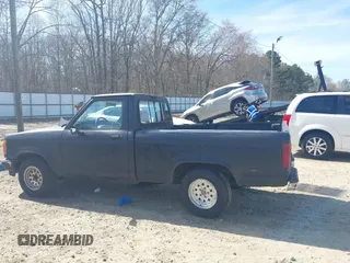 1992 Ford Ranger XLT z VIN 1FTCR10X3NUA73868, wystawiony jako IAAI lot #41836220 z przebiegiem 97 165 mil mil oraz . Historia ofert i sprzedaży dostępna na DreamBid. Obrazek 14.