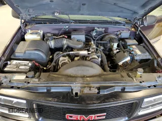 1997 GMC Yukon with VIN 1GKEC13R2VJ734299, listed as a Copart auction lot 74988224 with 225,335 mi miles and Salvage Title. Bid and sale history available at carsss.com. Image 13.