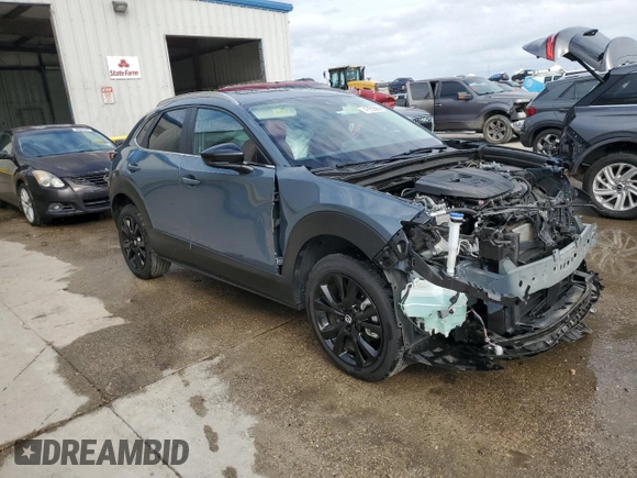2023 Mazda CX-30 S Carbon Edition with VIN 3MVDMBCM9PM573338, listed as a Copart auction lot 47955565 with 19,814 mi miles and Salvage Title. Bid and sale history available at DreamBid. Image 4.
