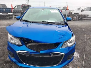 2018 Chevrolet Sonic LT z VIN 1G1JD5SHXJ4120089, wystawiony jako IAAI lot #41447426 z przebiegiem 42 931 mil mil oraz . Historia ofert i sprzedaży dostępna na DreamBid. Obrazek 12.