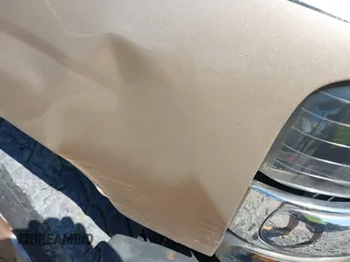 2005 Chevrolet Suburban LT z VIN 1GNEC16Z45J225720, wystawiony jako IAAI lot #41896970 z przebiegiem 347 315 mil mil oraz . Historia ofert i sprzedaży dostępna na DreamBid. Obrazek 12.