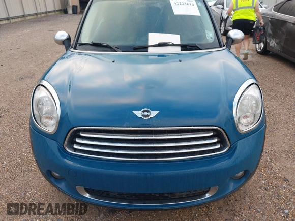 2012 MINI Countryman with VIN WMWZB3C56CWM06101, listed as a IAAI auction lot 42223616 with 149,680 mi miles and . Bid and sale history available at DreamBid. Image 6.