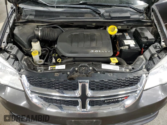 2015 Dodge Grand Caravan SXT with VIN 2C4RDGCG5FR622086, listed as a Copart auction lot 51769155 with 217,538 mi miles and Salvage Title. Bid and sale history available at DreamBid. Image 13.