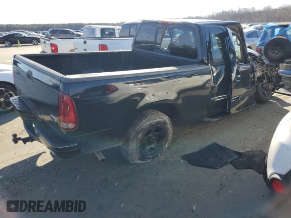 2002 Ford F-150 XL with VIN 1FTRX17W52NB83825, listed as a Copart auction lot 85794444 with 0 mi miles and Salvage Title. Bid and sale history available at carsss.com. Image 3.