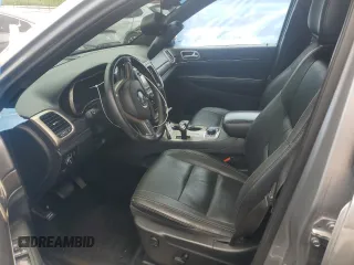 2014 Jeep Grand Cherokee Limited z VIN 1C4RJFBG7EC204799, wystawiony jako Copart lot #62458805 z przebiegiem 126 966 mil mil oraz Szkoda całkowita • Salvage title. Historia ofert i sprzedaży dostępna na DreamBid. Obrazek 7.