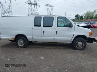 2006 Ford Econoline Cargo with VIN 1FTNS24L26DA37438, listed as a IAAI auction lot 42177090 with 181,459 mi miles and . Bid and sale history available at DreamBid. Image 14.