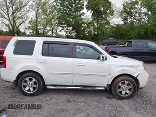 2011 Honda Pilot Touring z VIN 5FNYF4H9XBB053966, wystawiony jako IAAI lot #42148528 z przebiegiem 191 939 mil mil oraz . Historia ofert i sprzedaży dostępna na DreamBid. Obrazek 13.