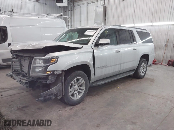 2018 Chevrolet Suburban LT z VIN 1GNSKHKC2JR201282, wystawiony jako IAAI lot #41312994 z przebiegiem 99 783 mil mil oraz . Historia ofert i sprzedaży dostępna na DreamBid. Obrazek 18.