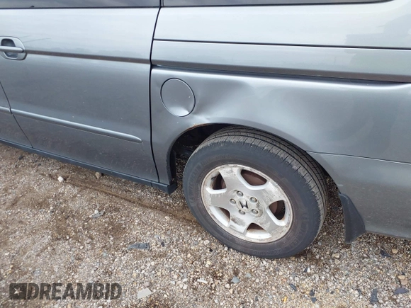 2000 Honda Odyssey EX z VIN 2HKRL1879YH516264, wystawiony jako IAAI lot #42109480 z przebiegiem 214 414 mil mil oraz . Historia ofert i sprzedaży dostępna na DreamBid. Obrazek 6.