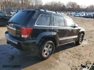 2006 Jeep Grand Cherokee Overland with VIN 1J8HR68256C334929, listed as a Copart auction lot 79450964 with 184,944 mi miles and Salvage Title. Bid and sale history available at carsss.com. Image 3.