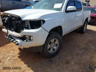 2016 Toyota Tacoma SR with VIN 5TFCZ5AN6GX031636, listed as a IAAI auction lot 41697761 with 154,571 mi miles. Bid and sale history available at carsss.com. Image 2.