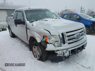 2009 Ford F-150 STX with VIN 1FTRX14829FA71591, listed as a IAAI auction lot 41322108 with 164,734 mi miles. Bid and sale history available at carsss.com. Image 1.