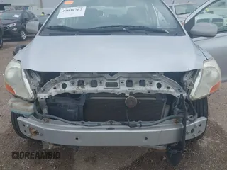 2008 Toyota Yaris with VIN JTDBT923184018720, listed as a IAAI auction lot 42038762 with 246,994 mi miles. Bid and sale history available at carsss.com. Image 6.