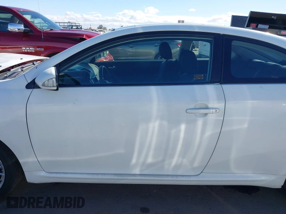 2005 Scion tC with VIN JTKDE167850026021, listed as a IAAI auction lot 41709118 with 130,895 mi miles. Bid and sale history available at carsss.com. Image 14.