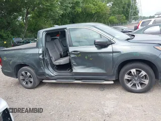 2018 Honda Ridgeline RTL-T with VIN 5FPYK3F61JB013733, listed as a IAAI auction lot 42548122 with 92,407 mi miles and . Bid and sale history available at DreamBid. Image 13.