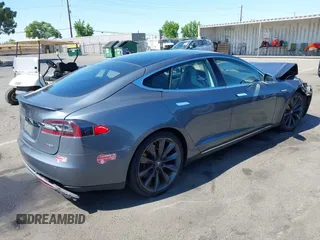 2014 Tesla Model S 60 with VIN 5YJSA1H19EFP36971, listed as a IAAI auction lot 42525811 with Not provided miles and . Bid and sale history available at DreamBid. Image 4.