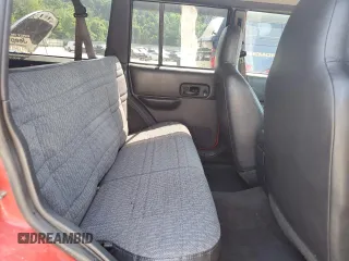 2000 Jeep Cherokee с VIN 1J4FF48S6YL129175, выставлен на аукционе Copart как лот 62481615 с пробегом Не указан миль и Списание • Salvage title. История ставок и продаж доступна на DreamBid. Изображение 11.