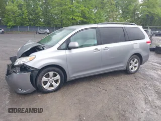 2012 Toyota Sienna LE AAS with VIN 5TDKK3DC8CS227401, listed as a IAAI auction lot 39425988 with 165,982 mi miles. Bid and sale history available at carsss.com. Image 2.
