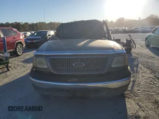 2002 Ford F-150 XL with VIN 1FTRF17W42NA89079, listed as a Copart auction lot 76519634 with Not Provided miles and Salvage Title. Bid and sale history available at carsss.com. Image 5.