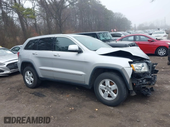 2013 Jeep Grand Cherokee Laredo with VIN 1C4RJFAGXDC537367, listed as a IAAI auction lot 41906921 with 124,679 mi miles. Bid and sale history available at carsss.com. Image 13.
