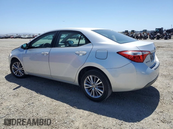 2014 Toyota Corolla L with VIN 5YFBURHE3EP048512, listed as a Copart auction lot 60905855 with 101,113 mi miles and Salvage title. Bid and sale history available at DreamBid. Image 2.