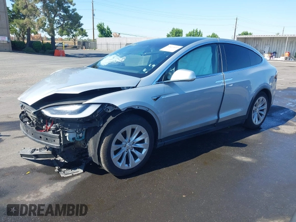 2016 Tesla Model X 70D with VIN 5YJXCAE21GF033123, listed as a IAAI auction lot 39813497 with 162,509 mi miles and . Bid and sale history available at DreamBid. Image 21.