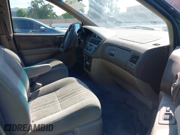 2000 Toyota Sienna LE with VIN 4T3ZF13CXYU312352, listed as a IAAI auction lot 42629403 with 166,361 mi miles and . Bid and sale history available at DreamBid. Image 5.