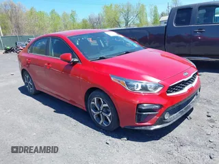 2021 Kia Forte LXS with VIN 3KPF24AD6ME299861, listed as a IAAI auction lot 42146614 with 54,896 mi miles. Bid and sale history available at carsss.com. Image 1.