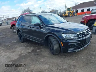 2021 Volkswagen Tiguan SE with VIN 3VV2B7AX1MM101432, listed as a IAAI auction lot 41982286 with 72,252 mi miles and . Bid and sale history available at DreamBid. Image 1.