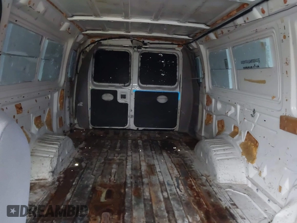2002 Ford Econoline Cargo with VIN 1FTSS34L62HA53783, listed as a IAAI auction lot 41403058 with 306,576 mi miles and . Bid and sale history available at DreamBid. Image 8.