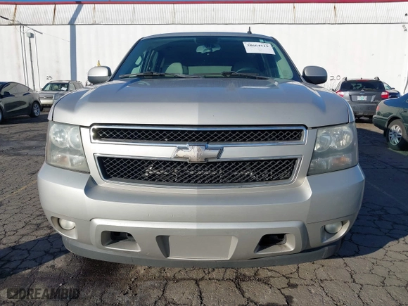 2009 Chevrolet Suburban LT w/2LT with VIN 1GNFC26099R177554, listed as a IAAI auction lot 38664519 with 311,063 mi miles. Bid and sale history available at carsss.com. Image 6.