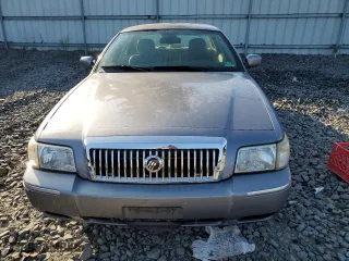 2006 Mercury Grand Marquis LS Premium with VIN 2MEFM75W76X619059, listed as a Copart auction lot 66880594 with 111,387 mi miles and Salvage Title. Bid and sale history available at carsss.com. Image 5.