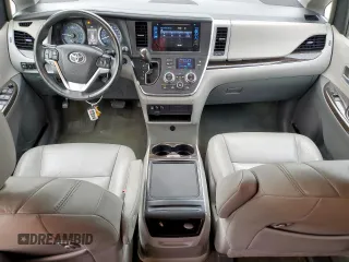 2016 Toyota Sienna XLE with VIN 5TDYK3DC9GS743458, listed as a Copart auction lot 60264865 with 65,272 mi miles and Salvage title. Bid and sale history available at DreamBid. Image 8.