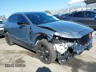 2024 Mazda CX-30 S Preferred with VIN 3MVDMBCM9RM619298, listed as a IAAI auction lot 41631549 with 14,513 mi miles and . Bid and sale history available at DreamBid. Image 1.