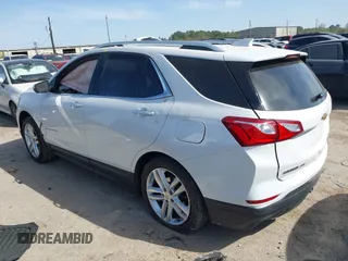 2018 Chevrolet Equinox Premier with VIN 2GNAXWEX3J6141427, listed as a IAAI auction lot 41830179 with 76,707 mi miles and . Bid and sale history available at carsss.com. Image 3.