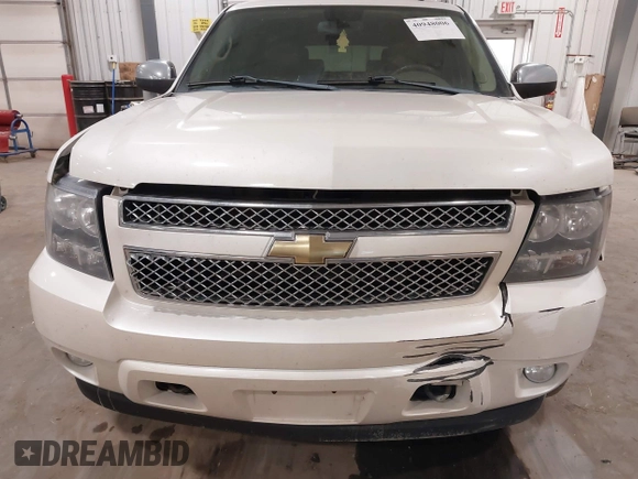 2010 Chevrolet Suburban LTZ with VIN 1GNUKKE31AR290571, listed as a IAAI auction lot 40948006 with 163,758 mi miles. Bid and sale history available at carsss.com. Image 6.