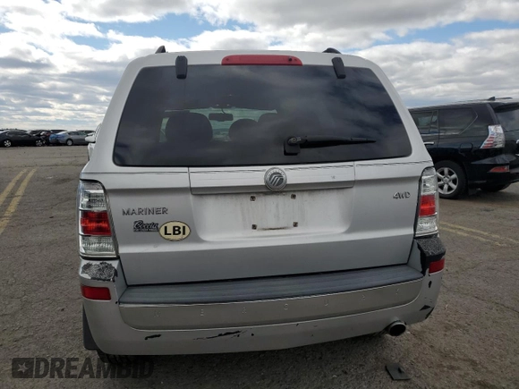 2009 Mercury Mariner z VIN 4M2CU91G99KJ03978, wystawiony jako Copart lot #54707175 z przebiegiem 106 520 mil mil oraz Szkoda całkowita • Salvage title. Historia ofert i sprzedaży dostępna na DreamBid. Obrazek 6.