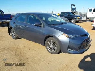2019 Toyota Corolla L z VIN 5YFBURHE6KP870037, wystawiony jako IAAI lot #41319522 z przebiegiem 81 344 mil mil oraz . Historia ofert i sprzedaży dostępna na DreamBid. Obrazek 1.