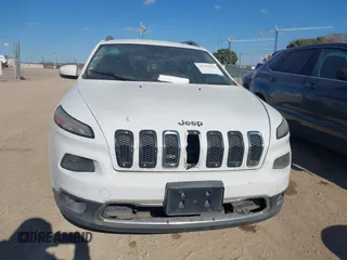2014 Jeep Cherokee Limited with VIN 1C4PJLDSXEW118473, listed as a IAAI auction lot 41359322 with 111,000 mi miles. Bid and sale history available at carsss.com. Image 11.