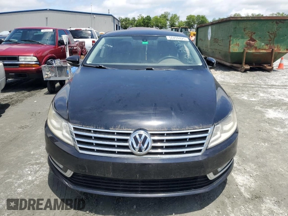 2013 Volkswagen CC Sport z VIN WVWBP7AN4DE551824, wystawiony jako Copart lot #58499425 z przebiegiem 121 809 mil mil oraz Tytuł czysty. Historia ofert i sprzedaży dostępna na DreamBid. Obrazek 5.